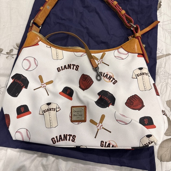 Dooney and Bourke - Picture 1 of 2